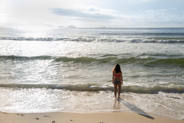   Citizen sunbathe on the beach of Copacabana