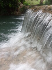 Fototapeta na wymiar waterfall on the river