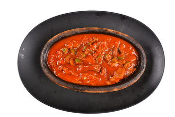 Traditional Turkish kebab meat saute.(kiremitte et sote) Traditional Turkish guvec kebap dish against a white background top view. menu photos