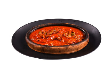 Traditional Turkish kebab meat saute.(kiremitte et sote) Traditional Turkish guvec kebap dish against a white background. menu photos