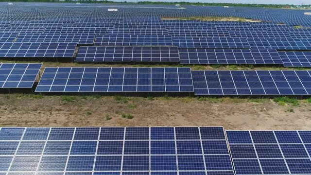 Flying over the rows of solar panels