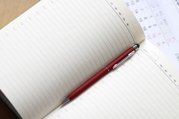 pen on notebook for planning ideas or working day 