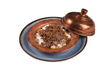 Turkish traditional food of Kastamonu tirit meal, yoghutr and bread. Turkish traditional food in white background and shadow. old turkish copper plate