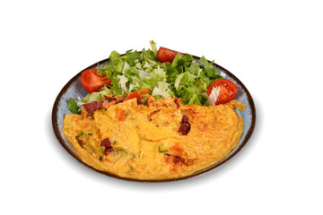 omelet with fresh vegetables salad on a white plate on white background.