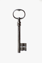 One old vintage metal key on white background. Security concept. Antique objects close up. Castle key secret