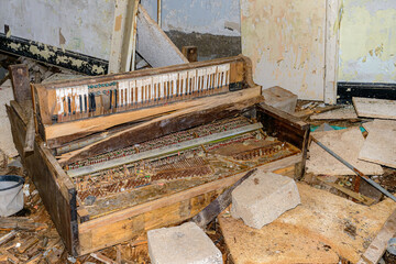 Broken Piano In An Abandoned Building