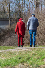 senior couple walking in spring
