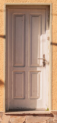 wooden door in a wall