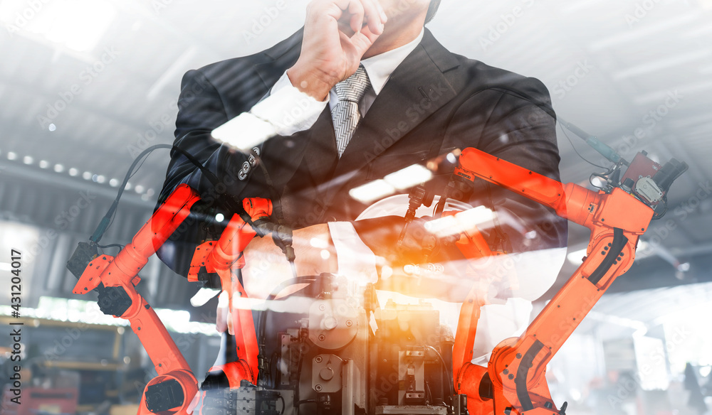 Poster mechanized industry robot arm and factory worker double exposure . concept of robotics technology fo