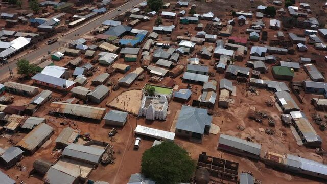 Aerial Larabanga Mosque village homes circle part 2.  Mosque is a Muslim mosque built in 1421, the oldest in west Africa and is considered the Mecca of West Africa.