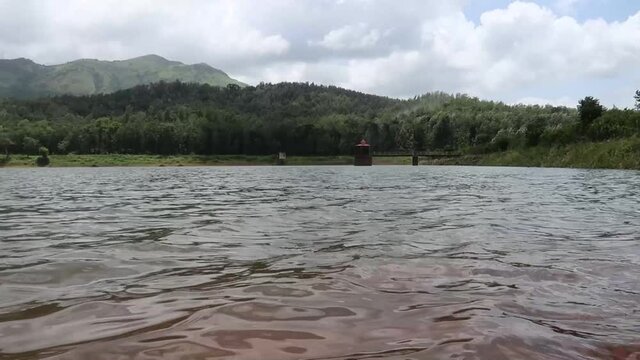 Hirekolale lake in the midst of mountains of western ghats at Chikmagalur, Karnataka
