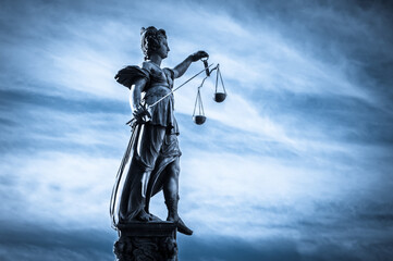 Lady Justice in morning breeze. Frankfurt am Main, Germany.