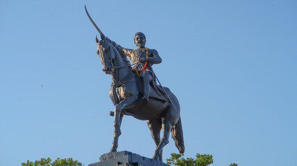 Statue of Chhatrapati Shivaji Maharaj on horseback riding a horse with raised sword Pratapgad, Maharashtra, India