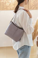 jeans, a blouse on a woman, a bag and a jacket in cookies. women's clothing store, show