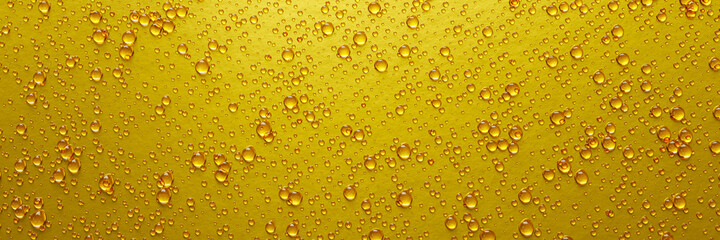 A lot of water droplets On metal or metallic surfaces in yellow and gold shades for mobile smartphone background or wallpaper. 3D Rendering.