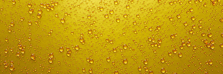 A lot of water droplets On metal or metallic surfaces in yellow and gold shades for mobile smartphone background or wallpaper. 3D Rendering.