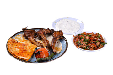 Traditional oriental Lamb chops and shashlik skewer with tomato and flatbread on white background. Turkish cuisine kebabs. (kuzu pirzola)