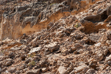 Background image of grunge part of mountain with stones or rocks in nature park of Jandia