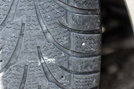a lone spike in a winter tire