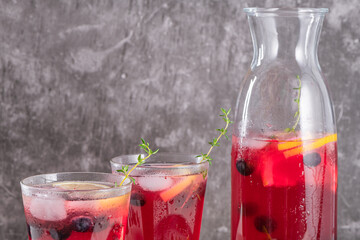 Fresh blueberry summer mojito cocktail. Blueberry lemonade or sangria on kitchen countertop