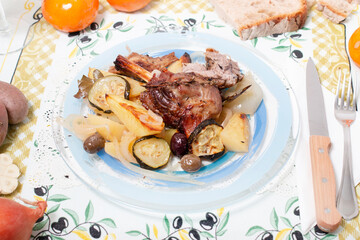 Roasted lamb with potato and zucchini