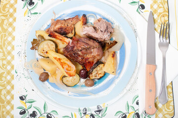 Roasted lamb with potato and zucchini