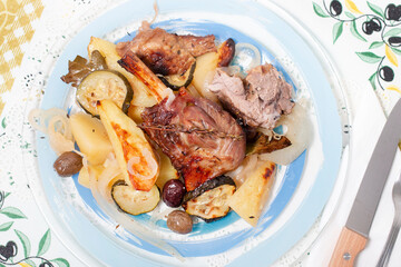 Roasted lamb with potato and zucchini