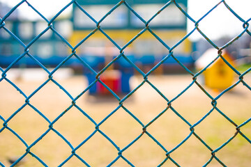 Fototapeta premium chain-link of blue color close-up, background is blured