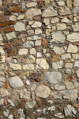 Old wall texture of various stones