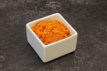 Tumeric powder in the bowl