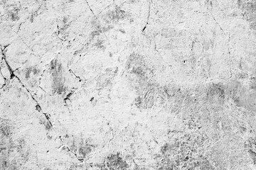 Texture of a concrete wall with cracks and scratches which can be used as a background