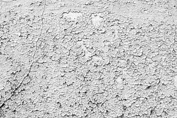 Texture of a concrete wall with cracks and scratches which can be used as a background