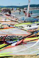 bunch of windsurf equipment