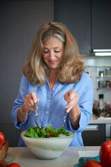 Senior Woman Tossing Salad