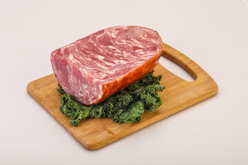 Beef ham piece over board