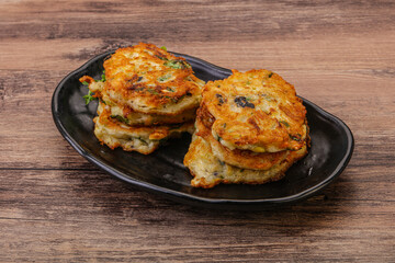 Zucchini pancakes with herbs and spices