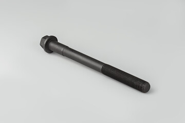 The crankshaft mounting bolt on a gray background. Cylinder head mounting bolt. Bolt for the...