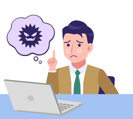 デスクワークする青年