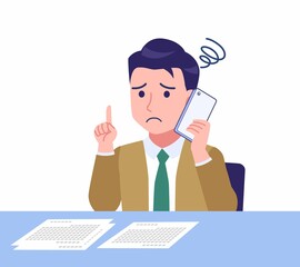 デスクワークする青年