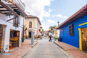 Fototapeta na wymiar Colourful buildings in the streets of La Candelaria neighborhood in Bogota, Colombia