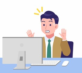 デスクワークする青年