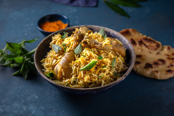 Pakistani and Indian chicken Biryani rice with mint and naa bread