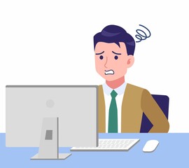 デスクワークする青年