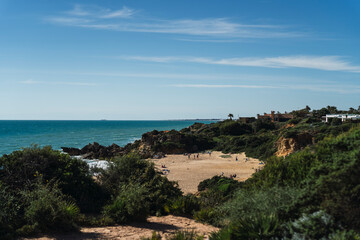 Fototapeta na wymiar Paisaje maritimo con playas en el sur de españa con acantilados y rocas