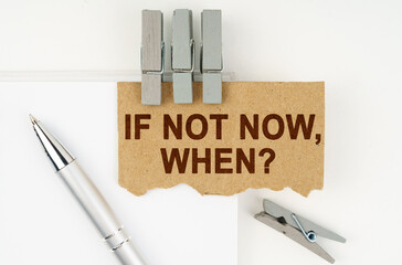 On a white background lies a notebook, a pen, clothespins and cardboard with the inscription - If...