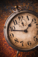 Old clock rustic close-up arrangement overhead on rustic vibrant background studio shot