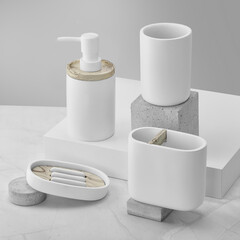 Set of bath accessories on grey background