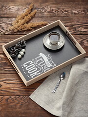Coffee on breakfast tray. wooden tray with cups