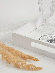 Coffee on breakfast tray.White wooden tray with cups