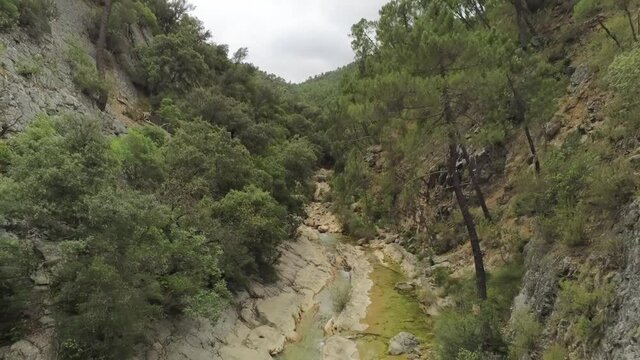 drone view of the Borosa riverbed and natural pools. Located in the Natural Park of the Sierras de Cazorla, Segura y las Villas, Spain.